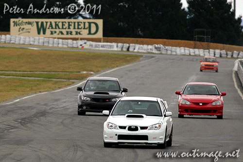 Not just for the boys! A young Asian woman driving a WRX at Wakefield Park Goulburn, NSW Australia. Circuit Club Day April 25, 2011.Wakefield Park Goulburn, NSW Australia. Circuit Club Day April 25, 2011. Photo copyright Peter Andrews, Outimage Australia.