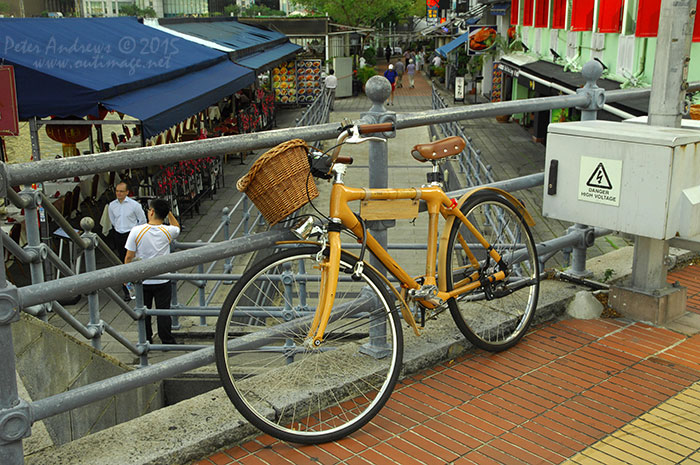 A neat looking bike chained to the the rails of the Elgin Bridge, above the Boat Quay pedestrian tunnel under South Bridge Road. Photo &copy; Peter Andrews / Outimage. Walking from Circular Road to Chinatown in Singapore as the city prepares for the Lunar New Year.