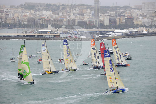 The fleet of second generation Volvo Open 70's break from the start line in Alicante, Spain for leg 1 of The Volvo Ocean Race. Next is a 6,500nm battle to Cape Town, South Africa. Photo copyright Rick Tomlinson - Volvo Ocean Race.