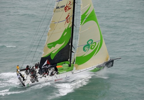 Green Dragon leaps over a wave after the start from Alicante, Spain for leg 1 of The Volvo Ocean Race. Photo copyright Rick Tomlinson - Volvo Ocean Race.