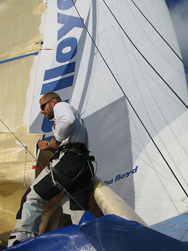 Gerd-Jan Poortman hard at work on Team Delta Lloyd, on leg 1 of the Volvo Ocean Race. Photo copyright Sander Pluijm - Team Delta Lloyd - Volvo Ocean Race. 