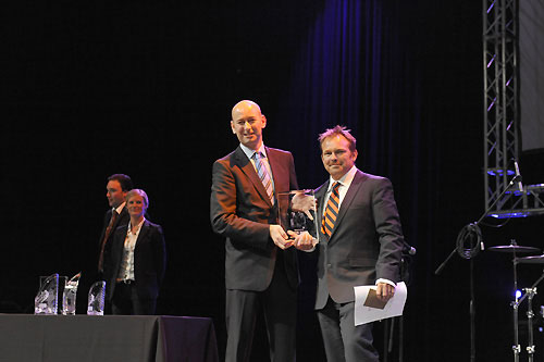 James Collett, Director of Commercial Solutions for Inmarsat left, presents Ericsson 4's Guy Salter from the Isle of Wight, UK, with the Media Crew Member award at the leg 1 prize giving ceremony in Cape Town, South Africa. The media crew member has been introduced for the first time to the Volvo Ocean Race, seeing the crewman shoot video, stills, write and record audio, capturing all of the life and action onboard the boats. Photo � Rick Tomlinson / Volvo Ocean Race.
