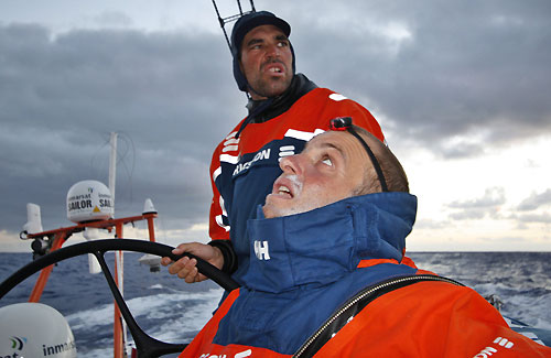Ryan Godfrey looks at the main whilst Stuart Bannatyne checks the incoming wind on leg 2 of the Volvo Ocean Race from Cape Town, South Africa to Cochin, India. Photo copyright Guy Salter / Ericsson 4 / Volvo Ocean Race.