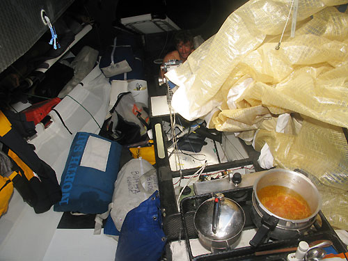 The crew of Telefonica Black fixing their sails, on leg 2 of the Volvo Ocean Race, from Cape Town, South Africa to Cochin, India. Photo copyright Mikel Pasabant / Telefonica Black / Volvo Ocean Race.