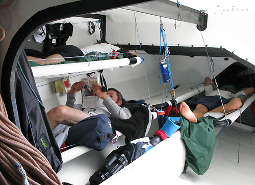 Pepe Ribes using a bit of free time reading a sailing magazine, on leg 2 of the Volvo Ocean Race, from Cape Town, South Africa to Cochin, India. Photo copyright Gabriele Olivo / Telefonica Blue / Volvo Ocean Race.