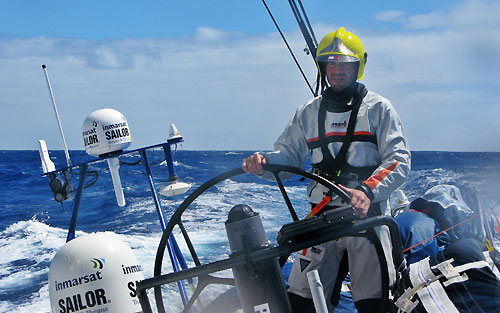 Skipper Chuny on the wheel during a sail change, right after the Delta Lloyd turned north to the Indian Ocean, on leg 2 of the Volvo Ocean Race, from Cape Town, South Africa to Cochin, India. Photo copyright Sander Pluijm / Team Delta Lloyd / Volvo Ocean Race.