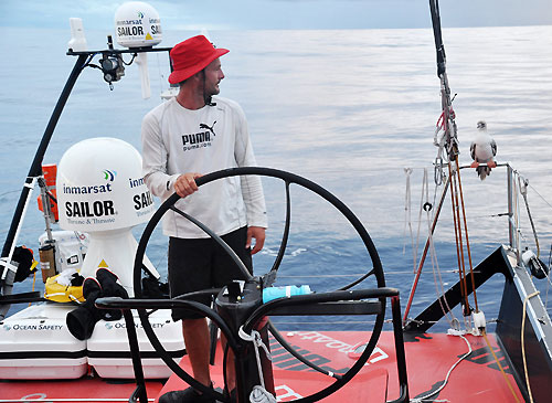 Sidney Gavignet makes a friend onboard il mostro, on leg 2 of the Volvo Ocean Race, from Cape Town, South Africa to Cochin, India. Photo copyright Rick Deppe / PUMA Ocean Racing / Volvo Ocean Race.