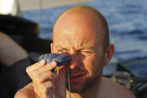 Green Dragon skipper Ian Walker checks the bearing on Delta Lloyd, on leg 2 of the Volvo Ocean Race, from Cape Town, South Africa to Cochin, India. Photo copyright Guo Chuan / Green Dragon Racing / Volvo Ocean Race.