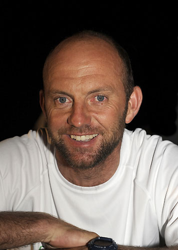 Green Dragon, skippered by Ian Walker from UK (pictured), finishes leg 2 of the Volvo Ocean Race from Cape Town, South Africa to Cochin, India. They crossed the line at 13:08:20 GMT, securing 2 points for the finish and 5 points overall for the leg. Photo copyright Rick Tomlinson / Volvo Ocean Race.