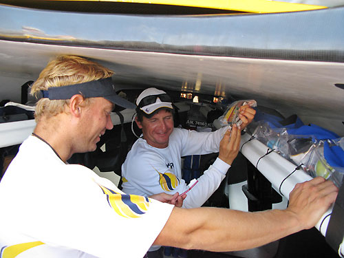 Wouter Verbraak left and Rodion Luka freshen up onboard Team Russia, during leg 3 of the Volvo Ocean Race, from India to Singapore. Photo copyright Sergey Bogdanov / Team Russia / Volvo Ocean Race.