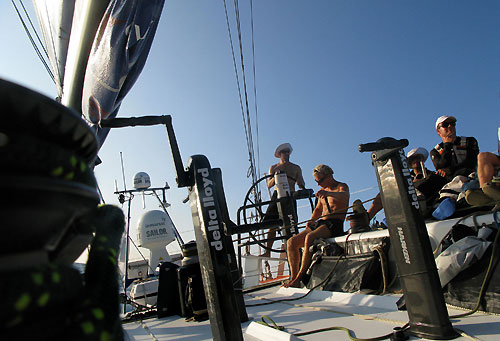 The day after the keel structure broke. Ed van Lierde is steering the boat with 11 knots upwind to sumatra, still in the race. sailing J4 and reef in the main. Steering Gerd-Jan Poortman, next in the sun Ed van Lierde, Martin Watts, Ryan Houston and Matt Gregory. Photo copyright Sander Pluijm / Team Delta Lloyd / Volvo Ocean Race.