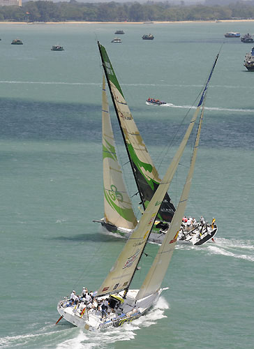 Telefonica Black, skippered by Fernando Echavarri (ESP) chases Green Dragon, skippered by Ian Walker (GBR) at the start of leg 4 of the Volvo Ocean Race, from Singapore to Qingdao, China. Photo copyright Rick Tomlinson / Volvo Ocean Race.