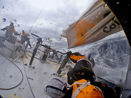 Xabier Fernandez and Pepe Ribes traying to pull some sails to windward onboard Telefonica Blue, while Jordi Calafat is driving. Photo copyright Gabriele Olivo / Telefonica Blue / Volvo Ocean Race.
