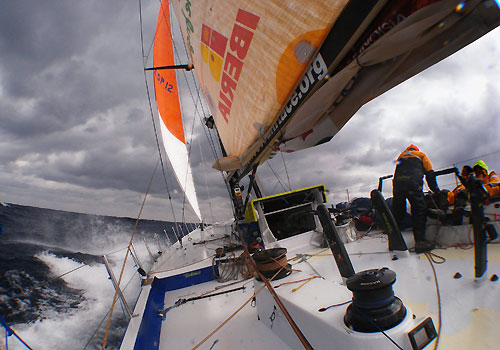 Repairing a chafed halyard. Pepe Ribes, Xabier Fernandez and Pablo Arrarte, on leg 4 of the Volvo Ocean Race, from Singapore to Qingdao, China. Photo copyright Gabriele Olivo / Telefonica Blue / Volvo Ocean Race.