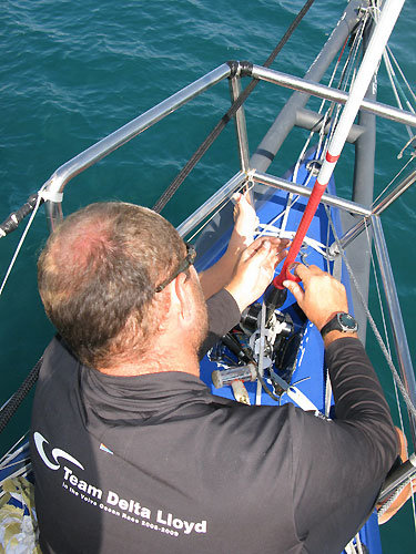 Martin Watts fixes the Forestay onboard Team Delta Lloyd while taking shelter in Salomique Bay, Philippines, earlier in Leg 4. Photo copyright Sander Pluijm / Team Delta Lloyd / Volvo Ocean Race.