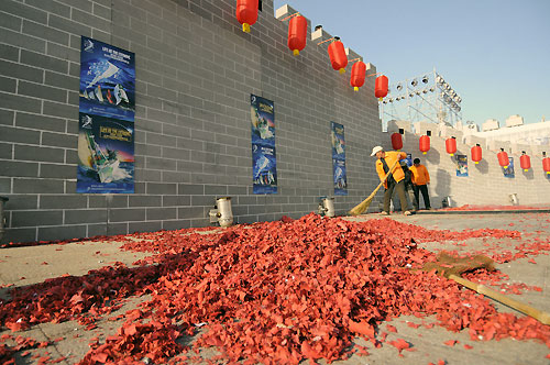 The official opening of the Volvo Ocean Race Qingdao Race Village featuring fireworks, drumming and chinese lions. What remains of fire crackers, ignited during the celebrations. Photo copyright Dave Kneale / Volvo Ocean Race.