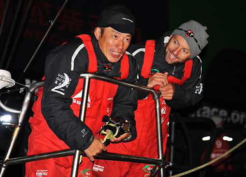 Onboard Green Dragon capturing all the action was Chinese media crew member Guo Chuan, who was given a hero's welcome as the crew pulled alongside the dock. Green Dragon, skippered by Ian Walker (GBR) finishes 4th on leg 4 of the Volvo Ocean Race in Qingdao, China. The Chinese / Irish boat crossed the finish line at 12:41:00 GMT. Photo copyright Rick Tomlinson / Volvo Ocean Race.
