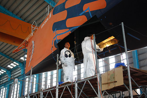 Ericsson 3 in Taiwan with their damaged bow section ready to be cut out, before the new piece is fitted. Photo copyright Gustav Morin / Ericsson 3 / Volvo Ocean Race.