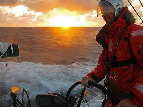 Phil Harmer at the helm of Green Dragon in full foul weather gear and helmet during Leg 5 from Qingdao to Rio de Janeiro. Photo copyright Guo Chuan / Green Dragon Racing / Volvo Ocean Race.