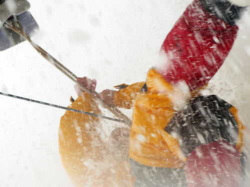Ryan Godfrey climbing to clew as a wave hits Ericsson 4, on leg 5 of the Volvo Ocean Race, from Qingdao to Rio de Janeiro. Photo copyright Guy Salter / Ericsson 4 / Volvo Ocean Race.