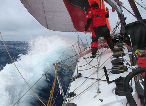 Erle Williams checks the trim to leeward, onboard PUMA Ocean Racing, on leg 5 of the Volvo Ocean Race, from Qingdao to Rio de Janeiro. Photo copyright Rick Deppe / PUMA Ocean Racing / Volvo Ocean Race.