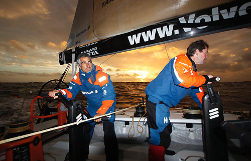 Horation Carabelli and Brad Jackson grinding at sunset onboard Ericsson 4, on leg 5 of the Volvo Ocean Race, from Qingdao to Rio de Janeiro. Photo copyright Guy Salter / Ericsson 4 / Volvo Ocean Race.