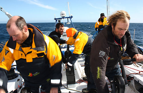 Grinding in light airs, onboard Telefonica Blue, on leg 5 of the Volvo Ocean Race, from Qingdao to Rio de Janeiro. Photo copyright Gabriele Olivo / Telefonica Blue / Volvo Ocean Race.