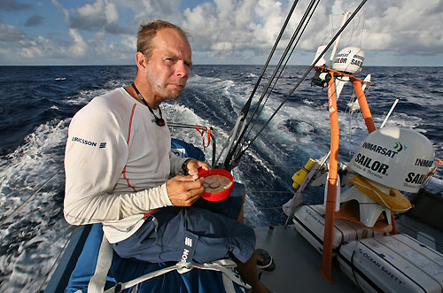 Thomas Johanson having breakfast as far aft as possible to keep the bow up, onboard Ericsson 3, on leg 6 of the Volvo Ocean Race, from Rio de Janeiro to Boston. Photo copyright Gustav Morin / Ericsson 3 / Volvo Ocean Race.