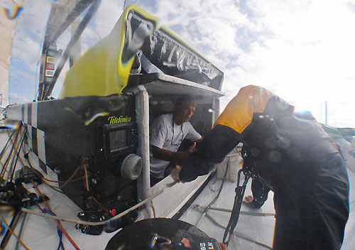 Navigator Roger Nilson talking to Skipper Fernando Echavarri, onboard Telefonica Black, on leg 6 of the Volvo Ocean Race, from Rio de Janeiro to Boston. Photo copyright Anton Paz / Telefonica Black / Volvo Ocean Race.