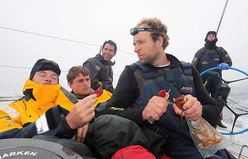 Lunchtime onboard Telefonica Black, on leg 7 from Boston to Galway. Photo copyright Anton Paz / Telefonica Black / Volvo Ocean Race.