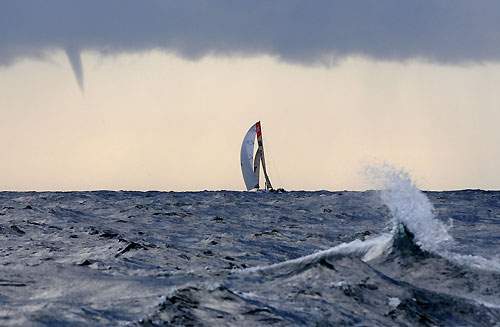 The start of a water spout coming down from the clouds at sunset. Ericsson 4, skippered by Torben Grael (BRA) at the start of leg 8 from Galway to Marstrand. Photo copyright Dave Kneale / Volvo Ocean Race.