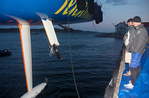 Telefonica shore crews work around the clock to fix the damage sustained when they ran aground at the start of leg 9. Photo copyright María Muina / Equipo Telefonica / Volvo Ocean Race.