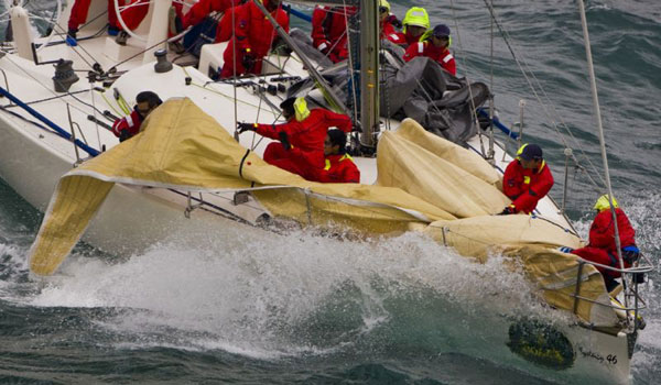 Skipper Ernesto Echauz initiates a sail change on Ma Fidel's Sydney 46, during the Rolex China Sea Race 2008. Photo Copyright ROLEX and Carlo Borlenghi.