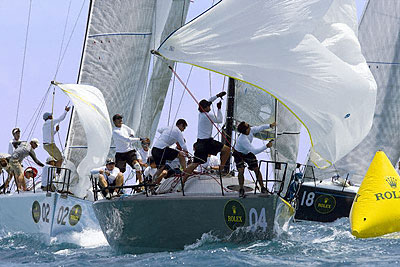 Helmut Jahn's Flash Gordon (USA) rounding the leeward mark ahead of William Douglass' Goombay Smash (USA) and Vincenzo Onorato's Mascalzone Latino (ITA). Photo copyright ROLEX Daniel Forster