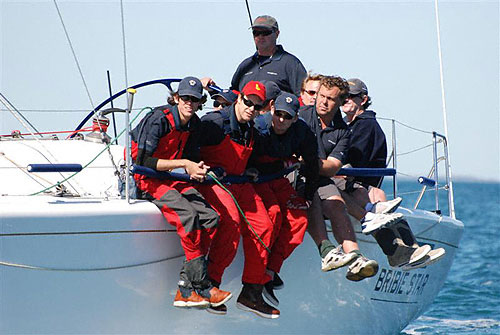 Crew along the rail of Kevin Miller and John Hassler�s Farr 40 Bribie Star, (skippered by Peter Sherwood) after the start of the Brisbane to Keppel Tropical Yacht Race. Photo Copyright, Suellen Hurling.