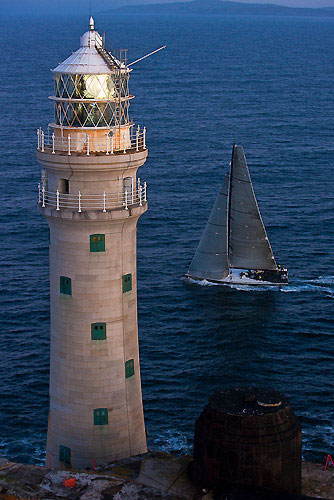 Niklas Zennstr&ouml;m&rsquo;s JV 72, RAN 2 at Fastnet Rock, during the Rolex Fastnet Race 2009. Photo copyright Rolex - Carlo Borlenghi.