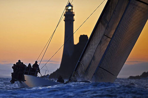 Niklas Zennstr&ouml;m&rsquo;s JV 72, RAN 2 at the Fastnet Rock, during the Rolex Fastnet Race 2009. Photo copyright Rolex - Kurt Arrigo.