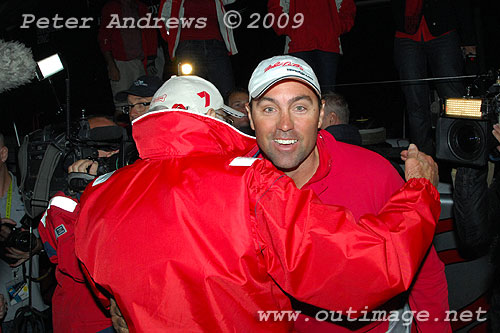Bob Oatley greets Skipper Mark Richards, after Wild Oats XI arrived to Hobart to complete the Rolex Sydney Hobart Yacht Race 2009. Photo copyright Peter Andrews, Outimage.