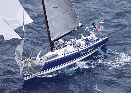 Deck maneuvers before turning the mark onboard Jim Richardson's Barking Mad. Photo copyright Daniel Forster, Rolex.