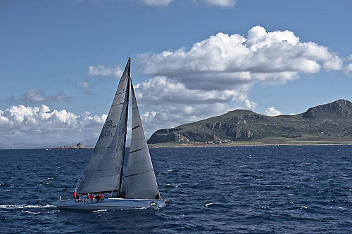 Marton Jozsa's Reichel Pugh 60 Wild Joe sailing past Favignana, during the 31st Rolex Middle Sea Race. Photo copyright Rolex and Kurt Arrigo.