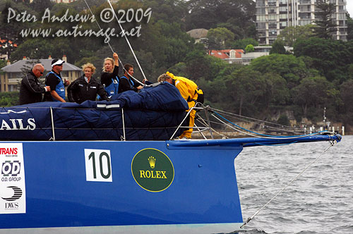 Sophie Ciszek seen on the bow of Grant Warrington&rsquo;s ill-fated Etihad Stadium, after pulling out of the Rolex Sydney Hobart 2009. Photo copyright Peter Andrews, Outimage Australia.