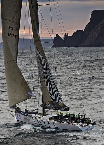 Sean Langman's 100-foot Elliott Investec Loyal, approaching Tasman Island during the Rolex Sydney Hobart 2010. Photo copyright Rolex and Carlo Borlenghi.