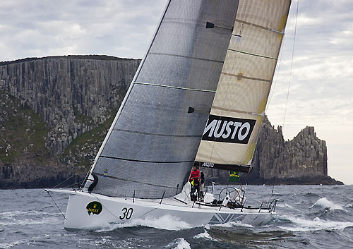 Geoff Boettcher&rsquo;s South Australian yacht Secret Mens&rsquo; Business 3.5 crossing Storm Bay during the Rolex Sydney Hobart Yacht Race. Photo copyright Rolex and Daniel Forster.