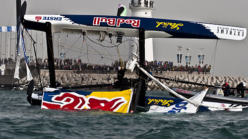 Team Red Bull Extreme Sailing capsizing on day 2 of racing, during the Extreme Sailing Series 2011, Qingdao, China. Photo copyright Pipornetti for Niceforyou.