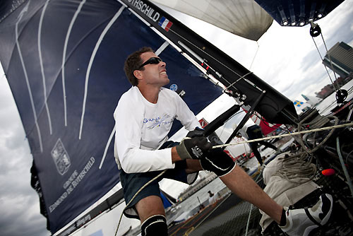 Bowman Herv&eacute; Cunningham in action onboard Groupe Edmond de Rothschild, during the Extreme Sailing Series 2011, Boston, USA. Photo Copyright Lloyd Images.