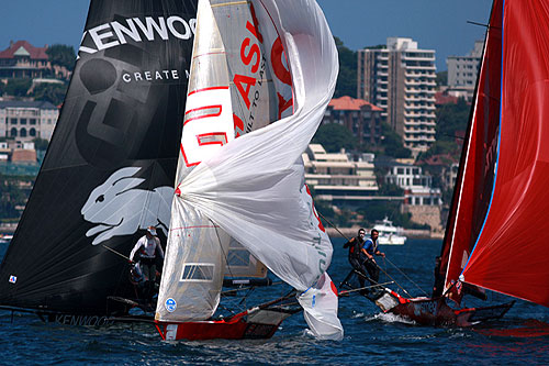 Asko Appliances dropping the kite ahead of Kenwood-Rabbitohs and Smeg, during Race 2 of the Australian 18 foot Skiff Championship on Sydney Harbour. Photo copyright Australian 18 Footers League.