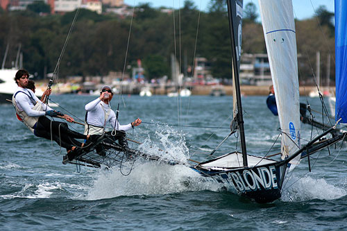 James Francis' Pure Blonde crew have time for a drink, during Race 2 of the Winning Appliances - JJ Giltinan 18ft Skiff Championship on Sydney Harbour, Sunday March 6, 2011. Photo copyright Australian 18 Footers League.