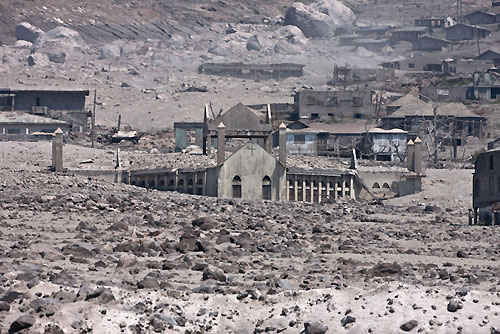 Remains of a town in the shadow of Montessart's active volcano, RORC Caribbean 600. Photo copyright Carlo Borlenghi.