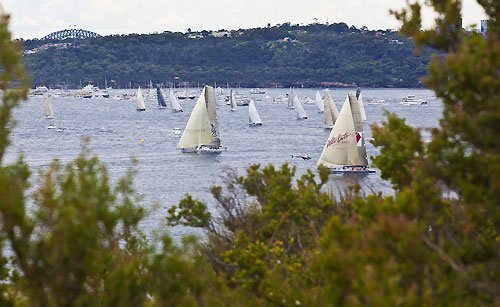 Bob Oatley's Wild Oats XI and Sean Langman and Anthony Bell's Elliott Maxi Investec Loyal, after the start of the Rolex Sydney Hobart 2010. Photo copyright Carlo Borlenghi, Rolex.