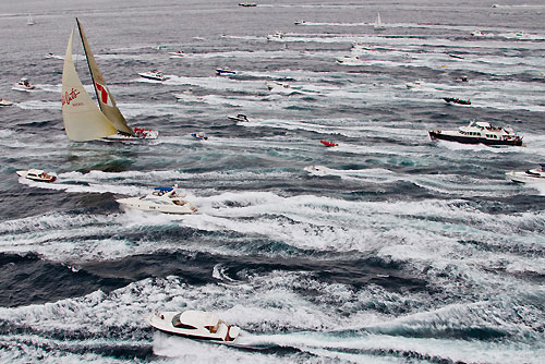 Bob Oatley's Wild Oats XI racing down the coast outside the heads of Sydney Harbour after the start of the Rolex Sydney Hobart 2010, Australia. Photo copyright Carlo Borlenghi, Rolex.
